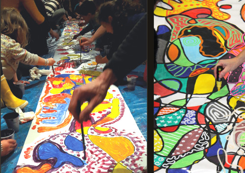 Mains qui peignent une fresque